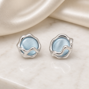 blue_shell_stud_earrings_luxury_scene_v1